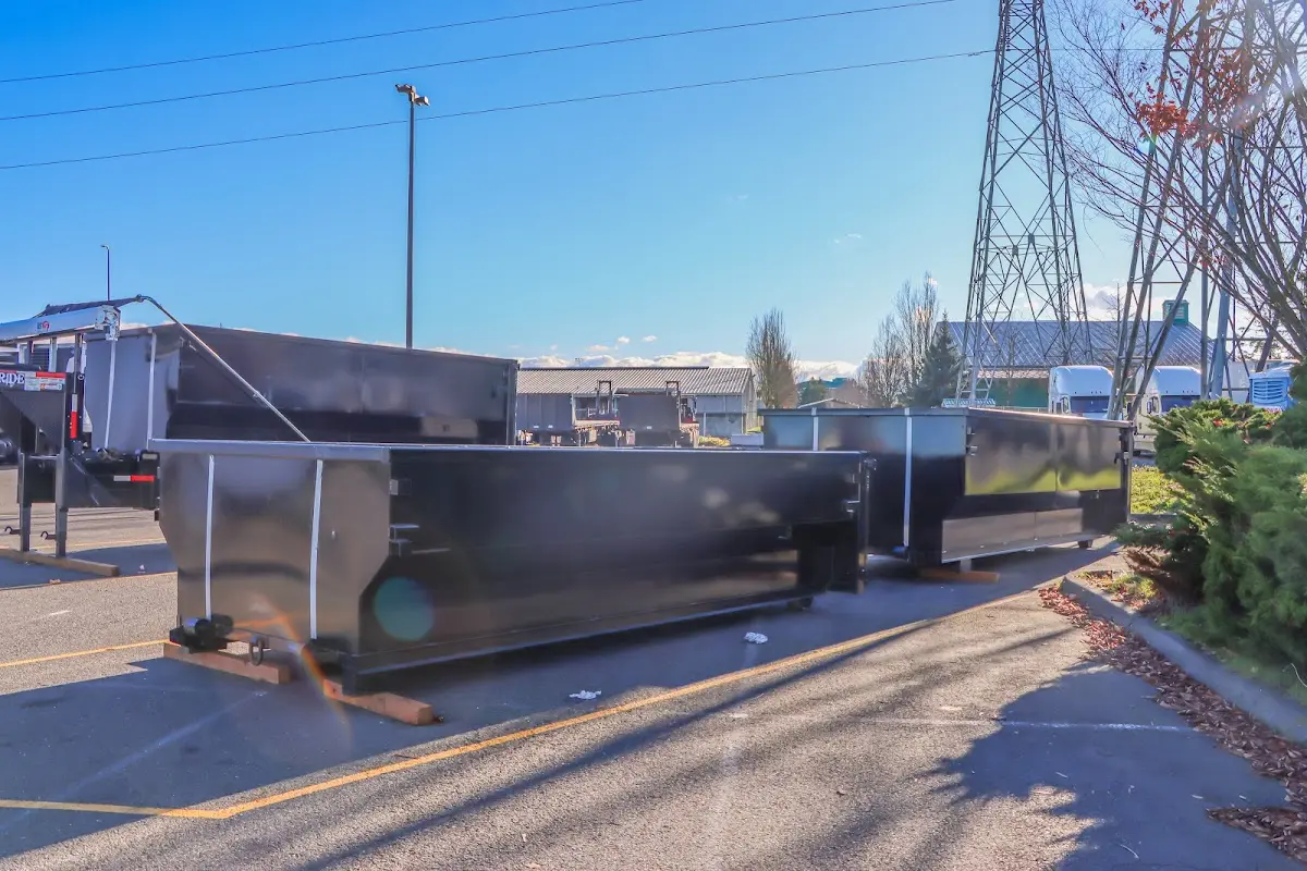 Roll-off dumpster ready for waste disposal at job site for Construction Dumpster Rental in Robinson